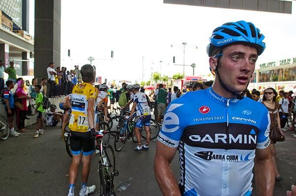 Nathan Haas (Garmin Barracuda) from Australia recovers after the second stage as teammate and tour leader David Zabriskie (behind) makes his way to the presentations.