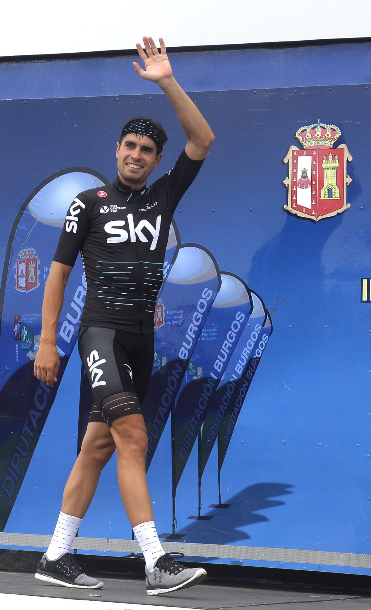 Stage winner Mikel Landa waves from the podium