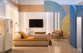 A living room with a pastel mural