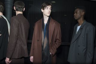Two male models wearing Paul Smith clothing