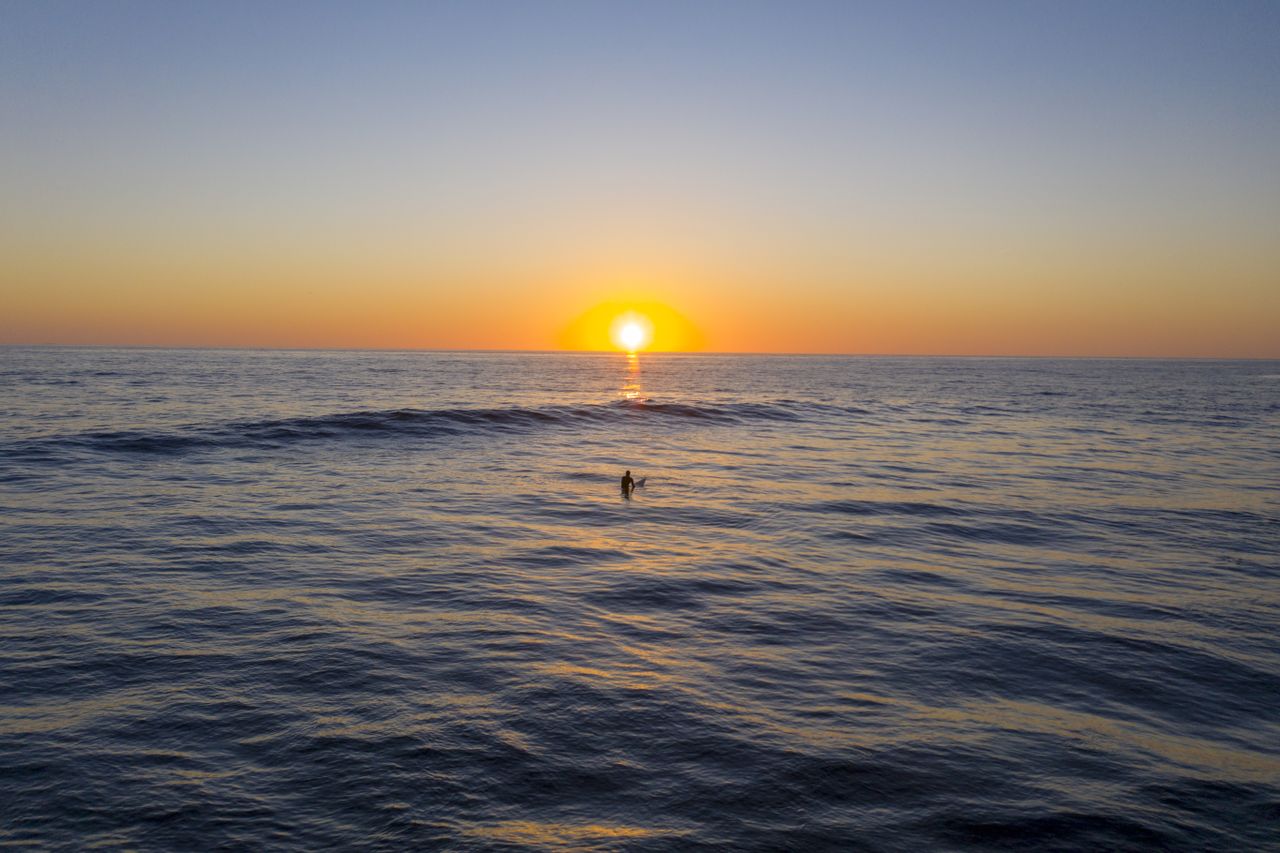 A surfer at Windansea Beach in La Jolla.