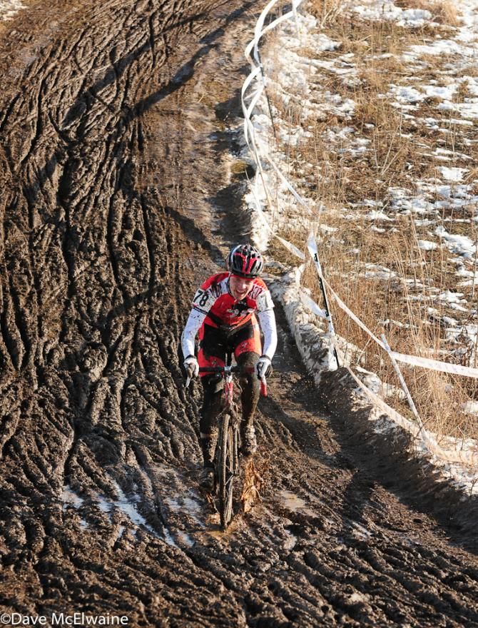 Isaac Jonas (KCOI U20) descending in the mud