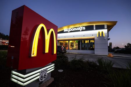 outside of McDonald's drive thru restaurant at dusk