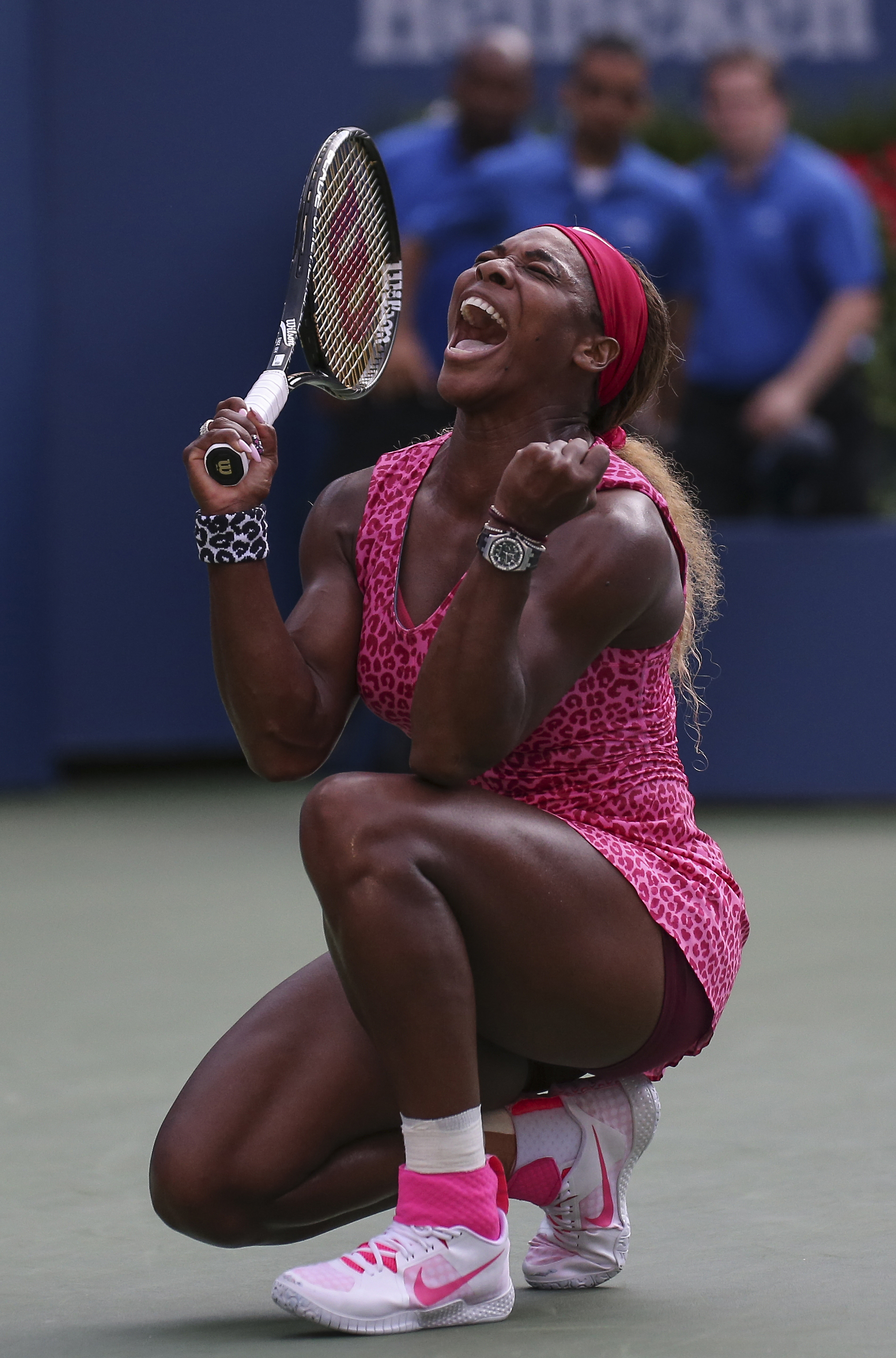 Serena Williams wearing leopard print and nikes