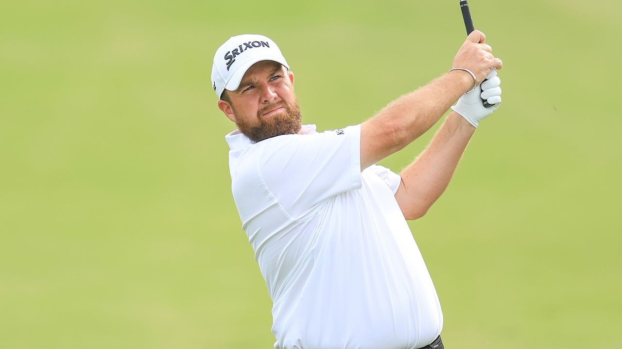 Shane Lowry plays an iron shot