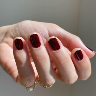 Burgundy and gold French tips