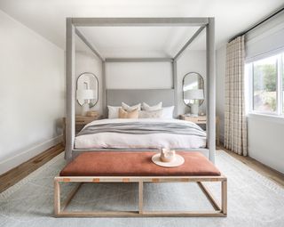 large bed with mirrors on both sides