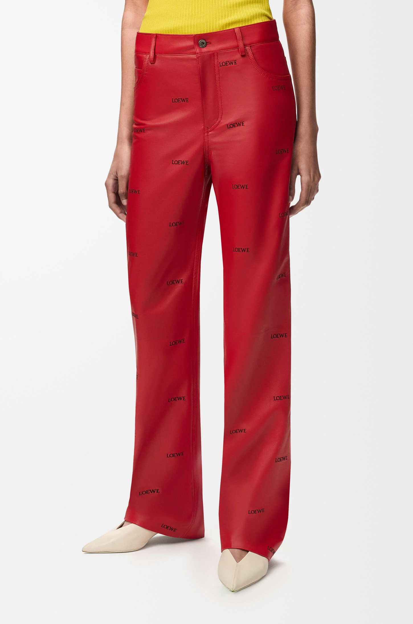 A model wearing red leather Loewe trousers.
