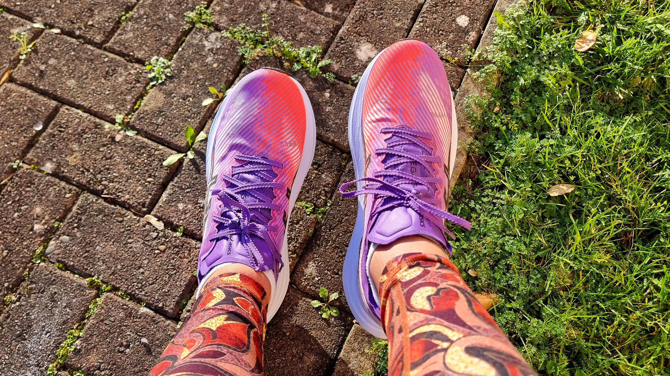 A close-up picture of our reviewer wearing the Asics Megablast running shoes