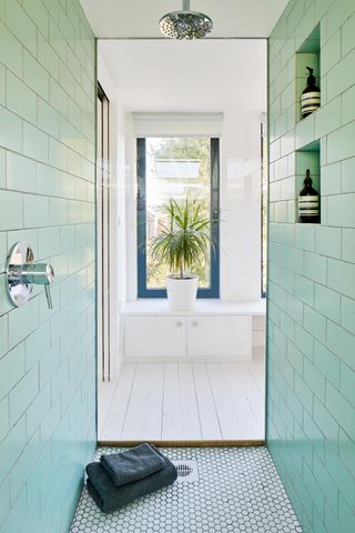 bathroom with pale blue tiles