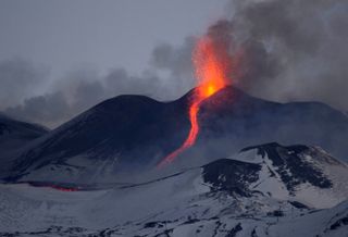Mount Etna erupted in a fiery display on Feb. 27, 2017. This photo, taken on Feb. 28, shows fountains of lava exploding from the famously active volcano.