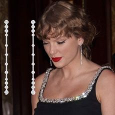 Taylor Swift in New York City wearing a pair of DeBeers diamond earrings