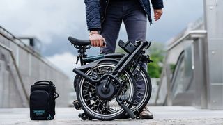 Brompton Electric C Line Explore folded into compact size