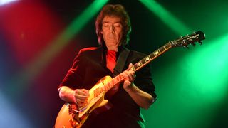 Steve Hackett performs on stage during the Genesis Revisited Tour at the Eventim Apollo on October 12, 2022 in London, England.