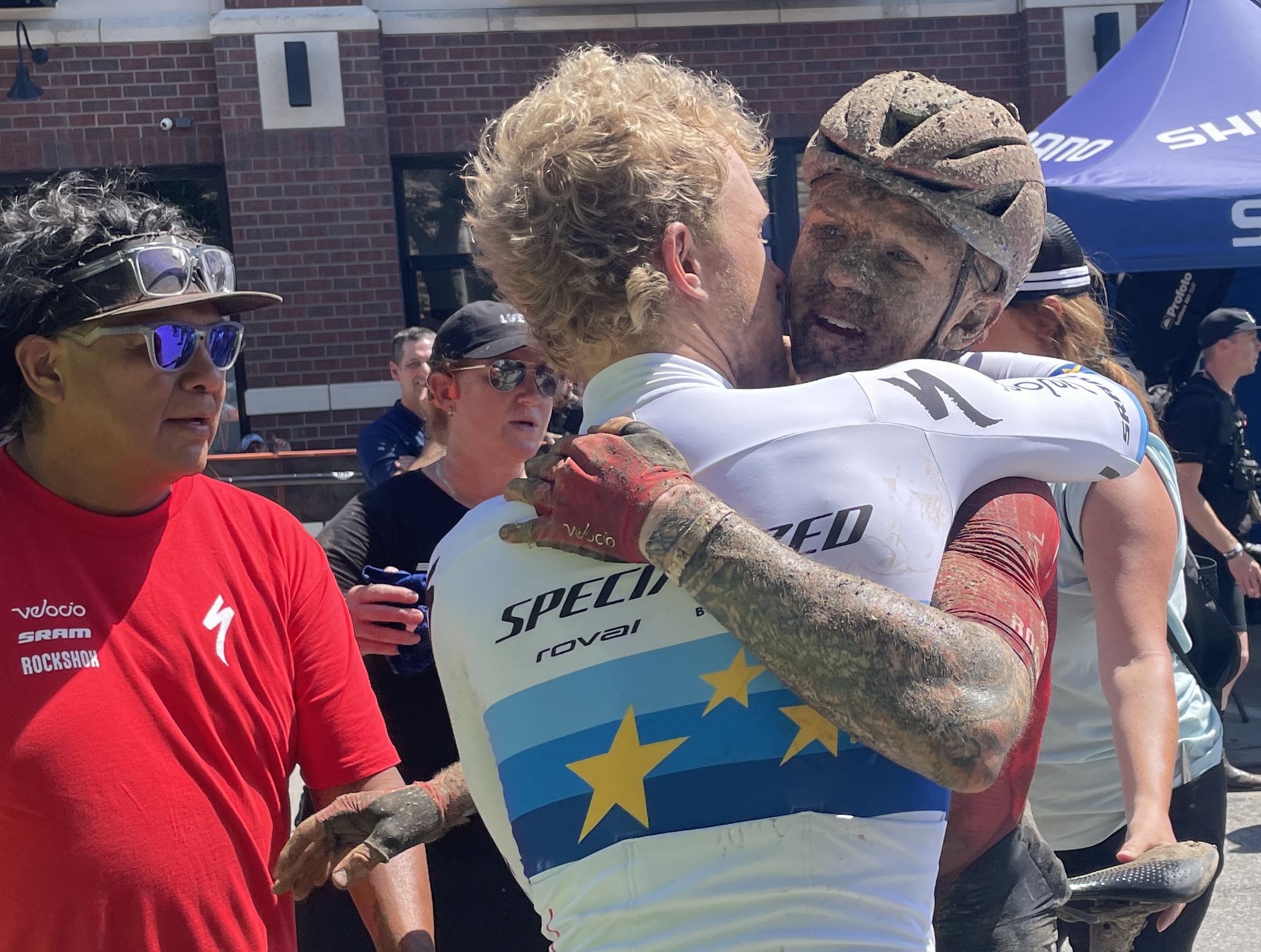 European gravel champion and Unbound 200 winner Mads W&uuml;rtz Schmidt give Keegan Swenson a hug at the 2026 finish for a wheel swap leading to the Dane's victory 