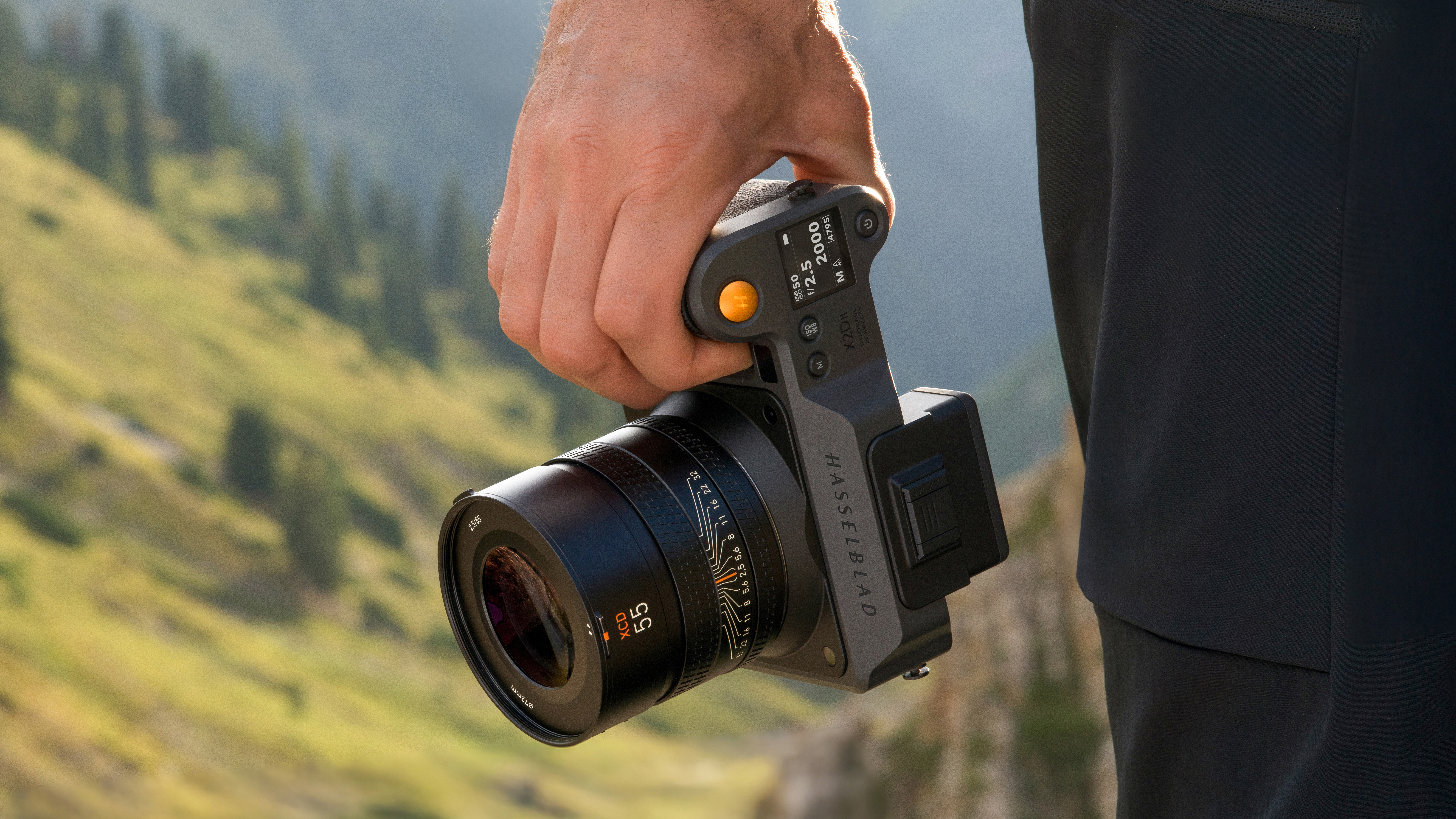 Hasselblad X2D II 100C being used by a photographer outdoors