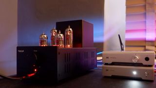 Drop + xDuoo TA-84 OTL Tube Amp/DAC on a desk with tubes lit up