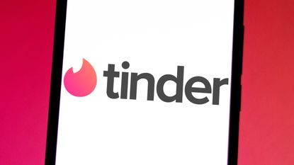 Tinder logo seen displayed on a smartphone