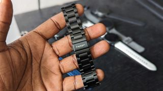 Holding the Spigen Modern Fit band for the Galaxy Watch 5
