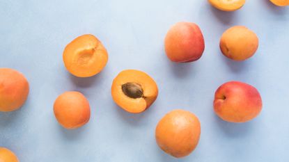 Peaches on a blue background