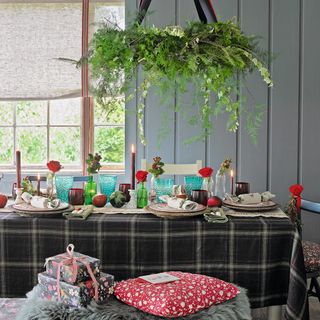 Dining room decorated for Christmas with real greenery
