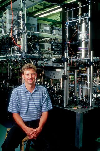 Kurt Gibble and then graduate student Chad Fertig designed and built an atomic clock that uses rubidium instead of cesium. The clock (shown here) is in his lab at Pennsylvania State University.