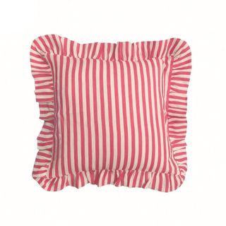 A red and white stripe outdoor cushion with ruffle edge