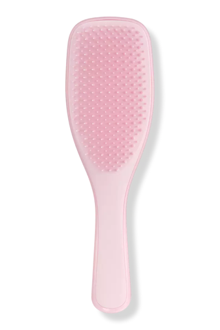 pink hair brush on a white background