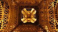 An image of the Eiffel Tower from below