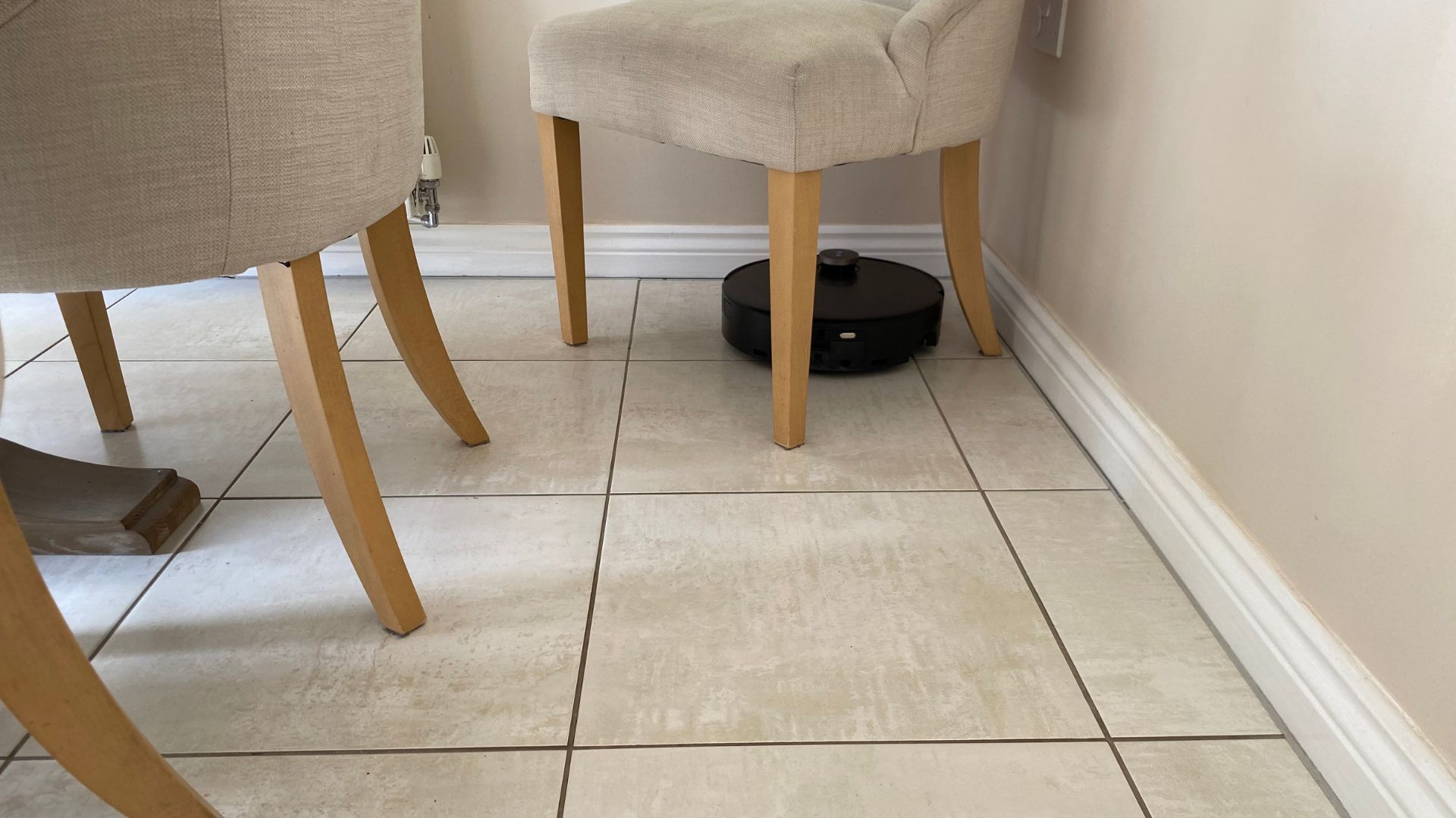 MOVA Z60 Ultra Roller Complete Robot Vacuum working on wooden floors in Carly's home