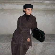 Ingrid Edvinsen wears the pillbox hat trend.