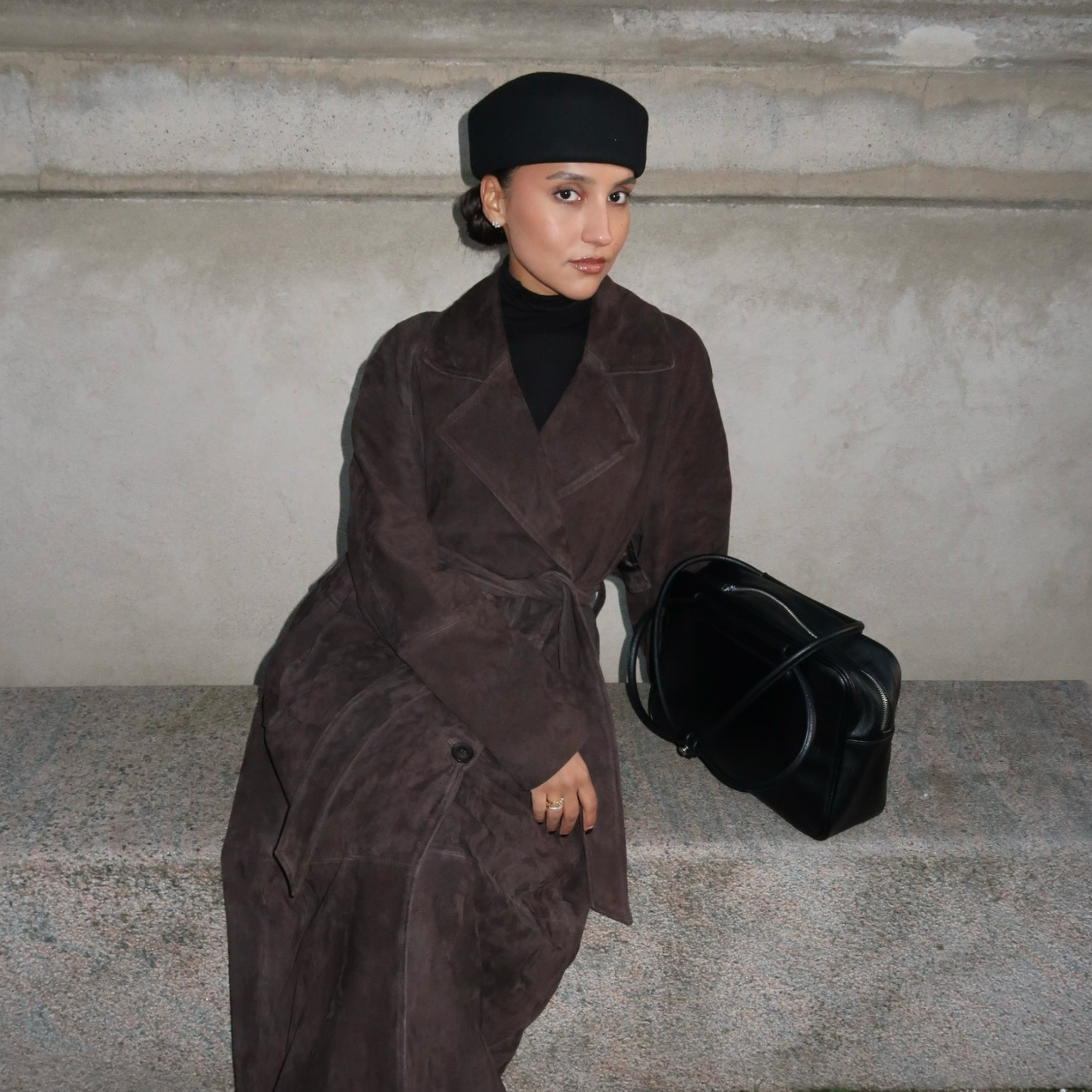 Ingrid Edvinsen wears the pillbox hat trend.