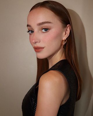 Actress Phoebe Dynevor with copper strands