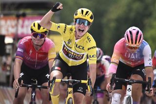 Team Jumbo Vismas Dutch rider Marianne Vos C celebrates as she cycles to the finish line to win the 6th stage of the new edition of the Womens Tour de France cycling race ahead of UAE Team ADQs Italian rider Marta Bastianelli placing second R and Team SD Worxs Belgian rider Lotte Kopecky placing third L 1292 km between SaintDielesVosges and Rosheim on July 29 2022 Photo by Jeff PACHOUD AFP Photo by JEFF PACHOUDAFP via Getty Images