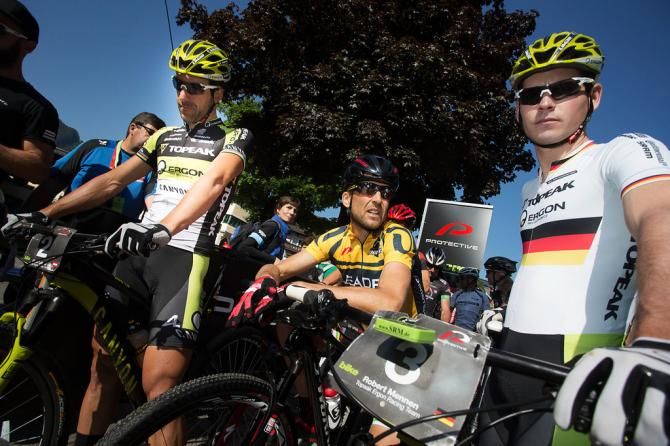 Race leader Christoph Sauser awaits the start