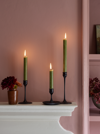 A mantle decorated with candles