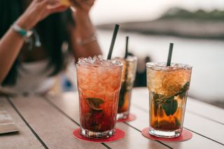 three cocktails on table