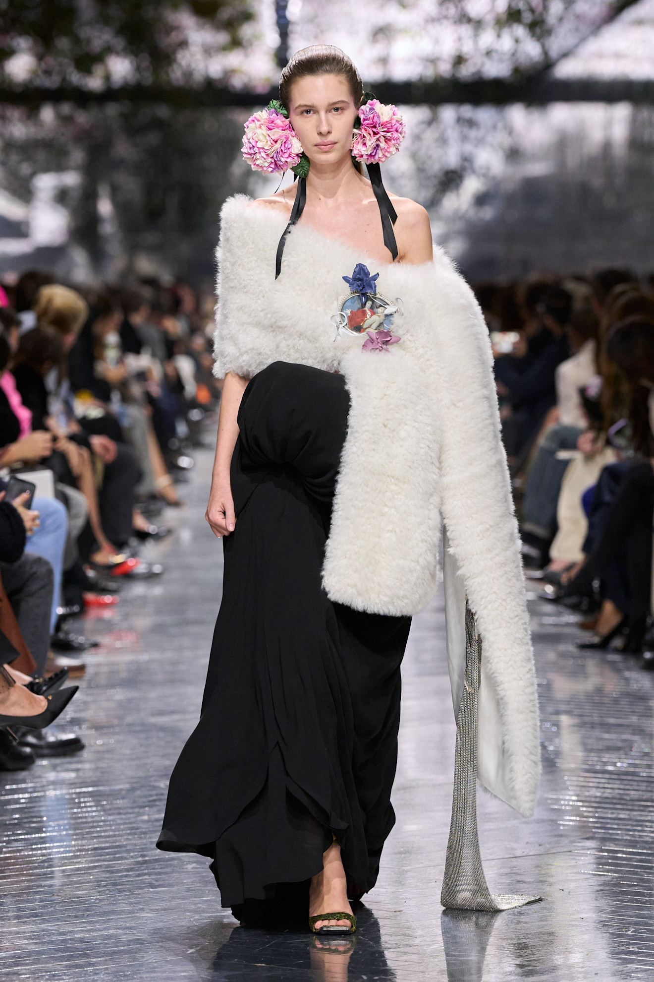 A model wore Rihanna's fur stole and floral earrings on the Dior Couture Spring 2026 runway