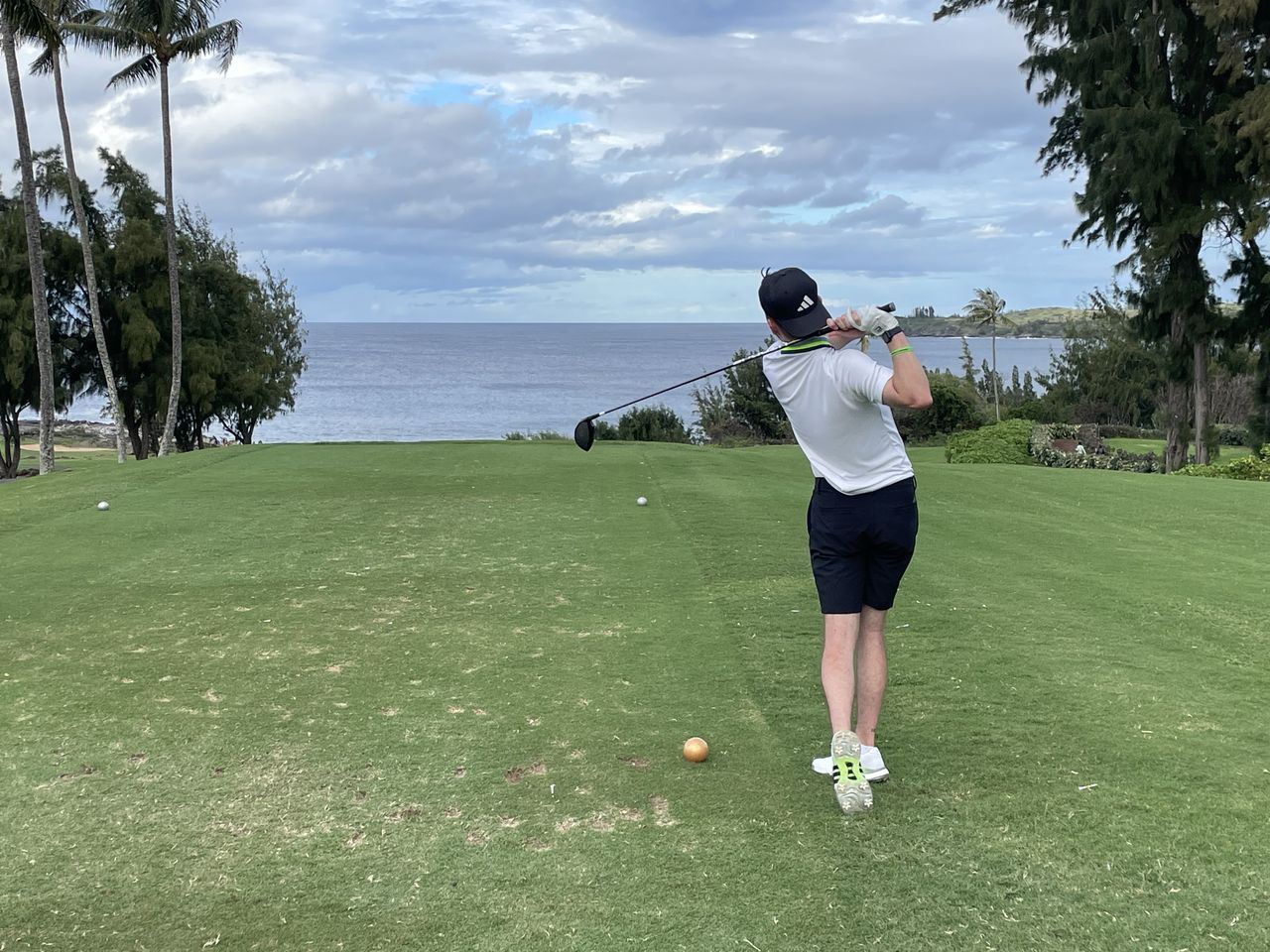 Dan Parker hitting a golf shot while testing the new Adidas Tour360 24 golf shoes