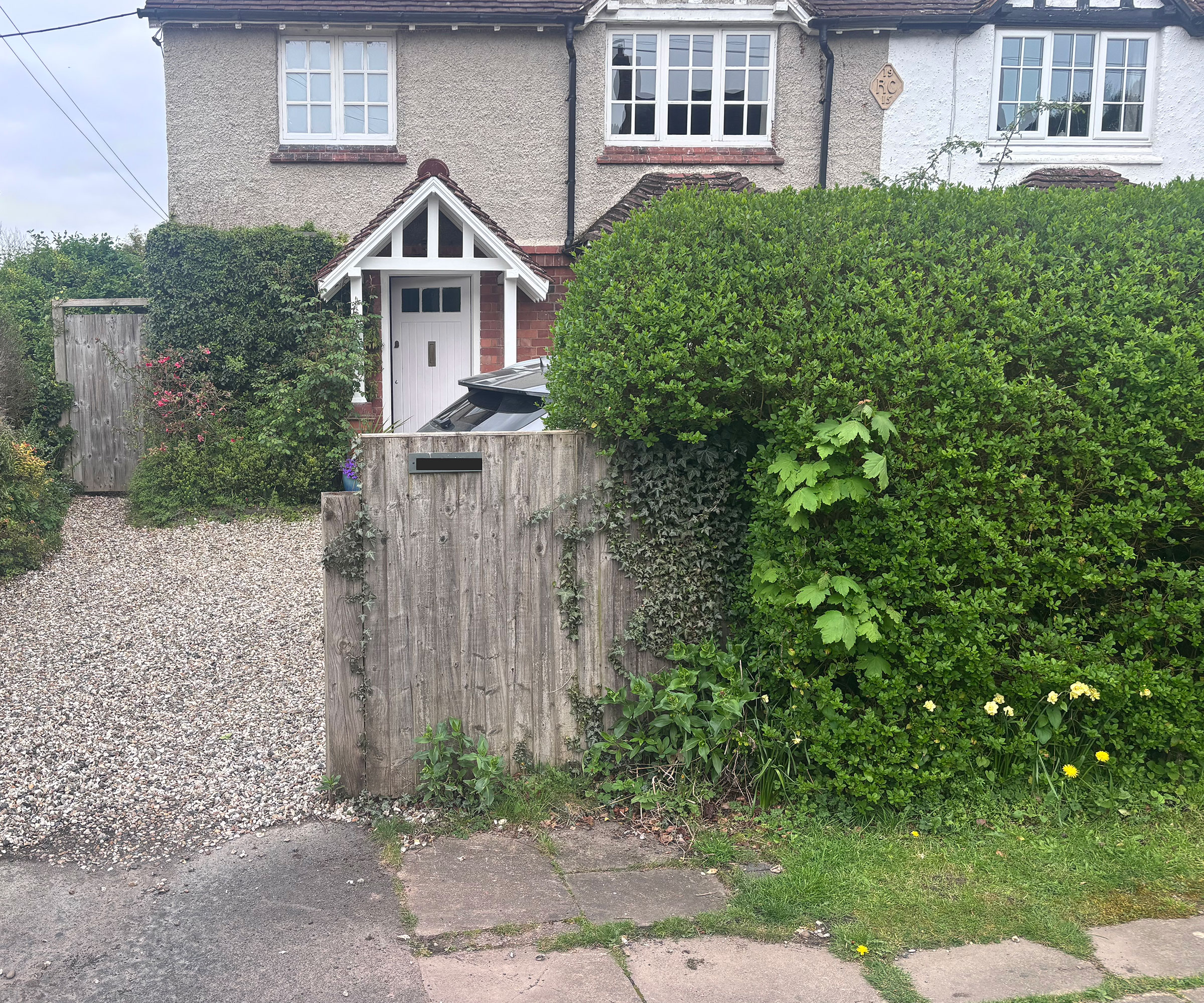 semi-detached house with gravelled driveway
