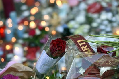 Flowers at a memorial outside the Bataclan concert hall in Paris