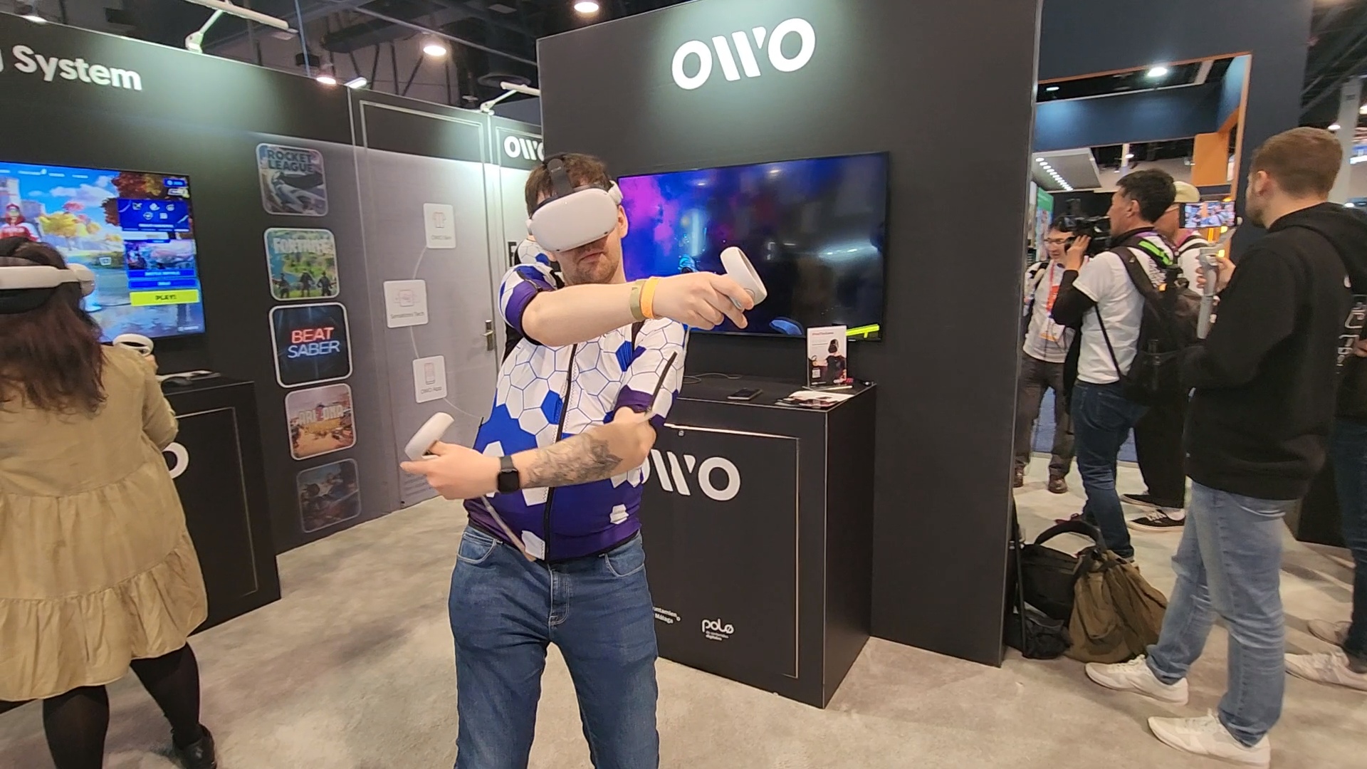 Jason England trying on the OWO VR haptic suit