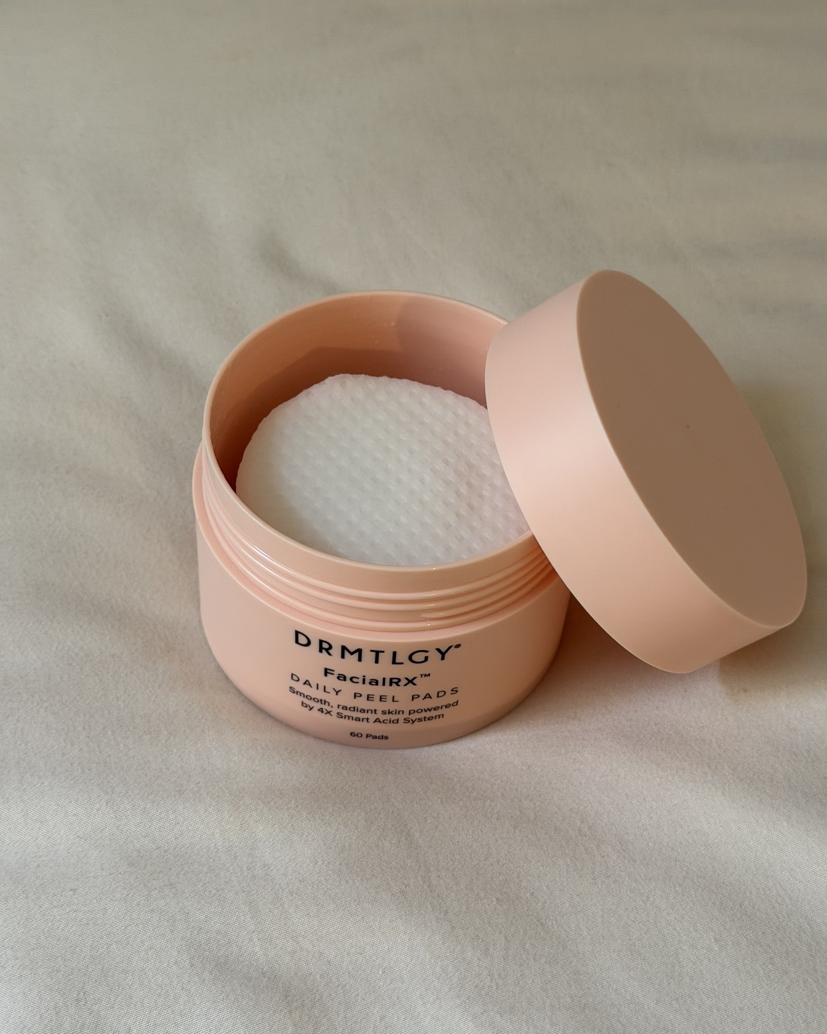 A jar of the Drmtlgy FacialRX Daily Peel Pads.