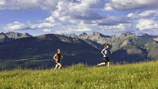 Trail runners on Vail mountain