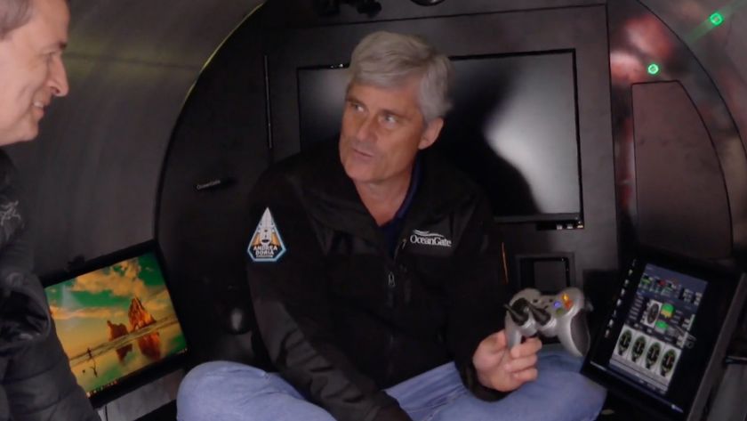 OceanGate CEO in conversation holding a Logitech gaming controller