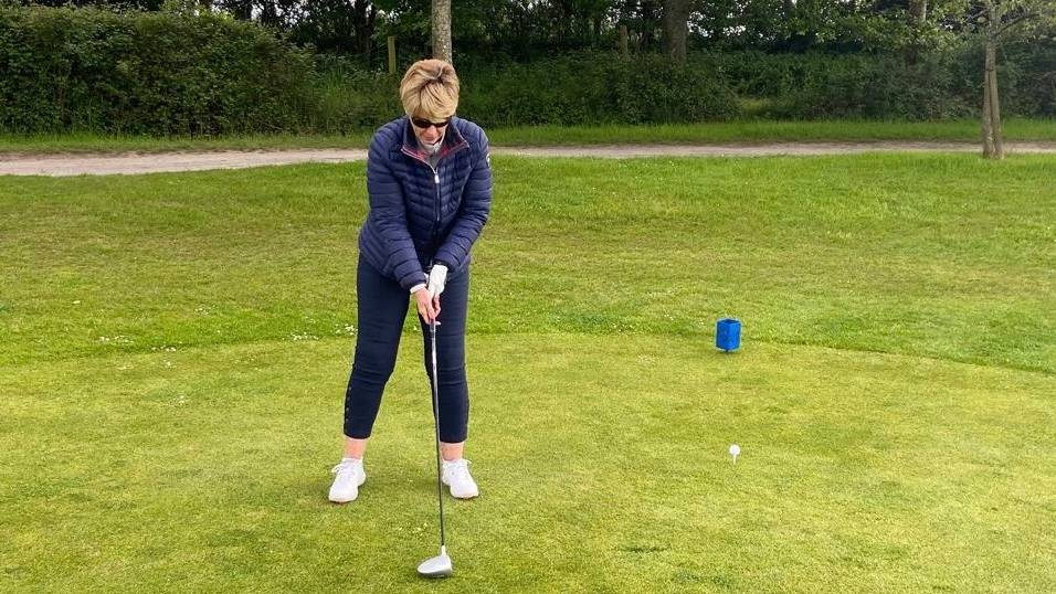 Female golfer on the 1st tee