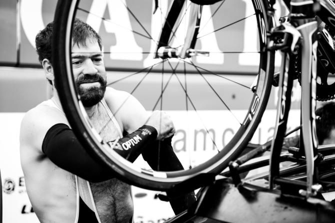 Mike Friedman kits up outside the team car for the Klasika Primavera de Amorebieta