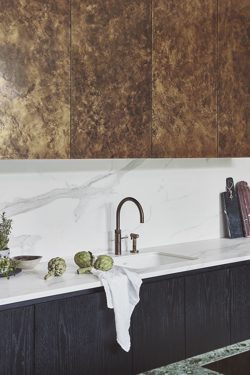 white kitchen backsplash ideas with patinated tap