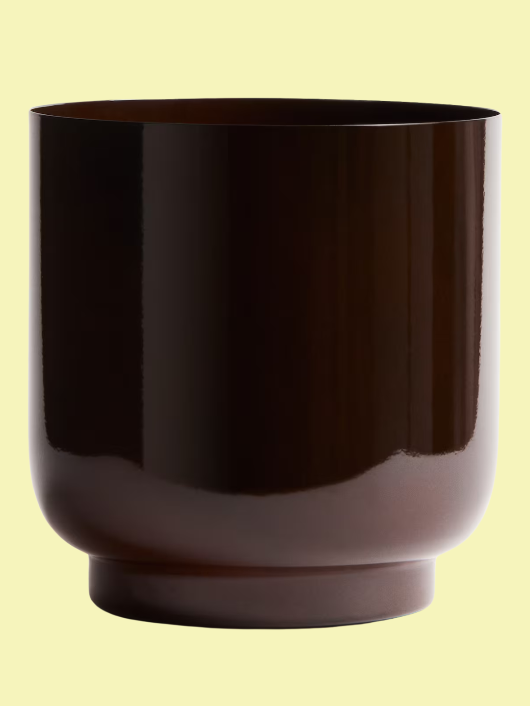 A dark brown metal plant pot from H&amp;amp;M