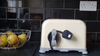 A cream kitchen with Dualit toaster and stand mixer